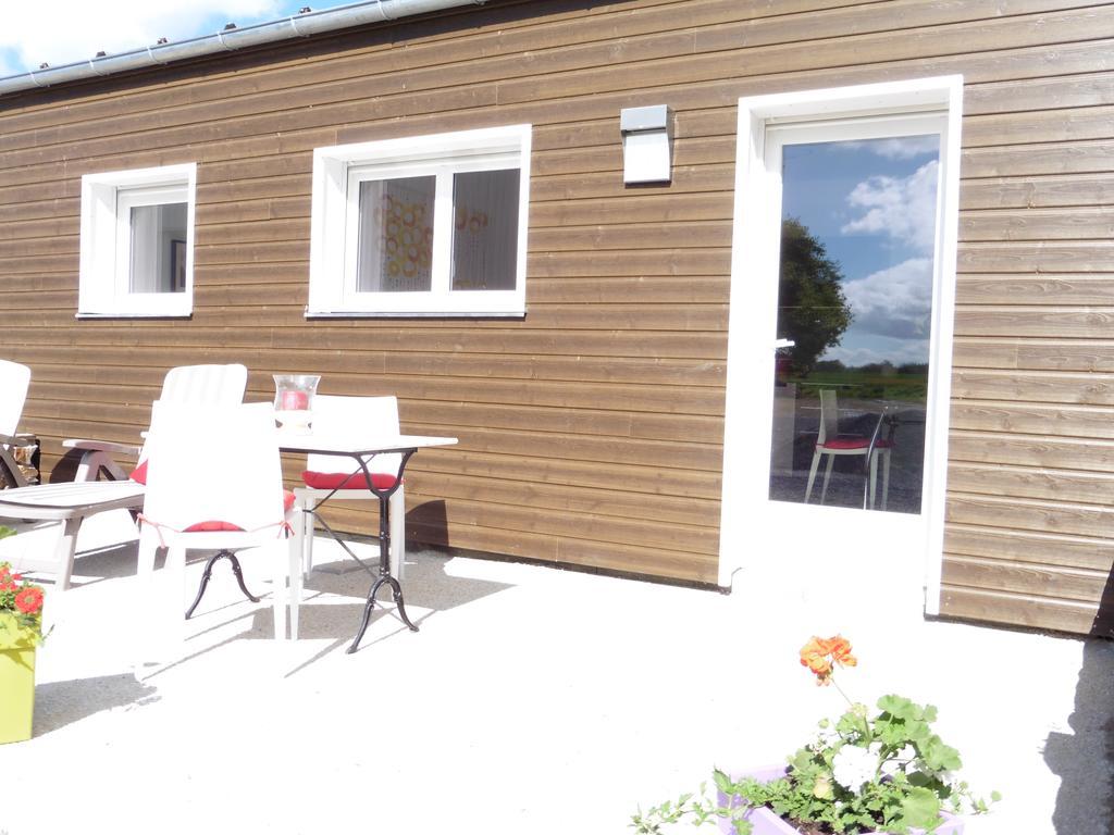 Cottages De La Ville Daniou Langrolay Bagian luar foto
